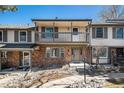 Charming townhome with brick facade and private balcony at 6762 E Briarwood Dr, Centennial, CO 80112