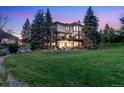 Lush backyard with deck, perfect for outdoor entertaining in a serene setting at 9980 Newton Ct, Westminster, CO 80031