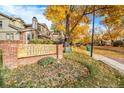 The Hideaway community entrance sign with autumn leaves at 5202 Union Ct # 2, Arvada, CO 80002