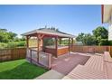 Backyard hot tub and deck for relaxation at 1791 S Laredo St, Aurora, CO 80017