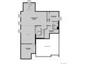 Basement floor plan featuring a recreation room, a bedroom and unfinished storage areas at 8686 Pennycress Dr, Littleton, CO 80125