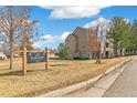 Condominium exterior with stone facade accents and Mountain Gate II signage at 7394 S Alkire St # 307, Littleton, CO 80127