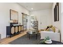 Bright living room featuring hardwood floors and a modern design at 717 Inca St, Denver, CO 80204