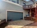 Attached garage featuring ample space, convenient access, and functional design at 4724 Hopi Rd, Indian Hills, CO 80454