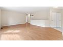 Spacious living area with gleaming hardwood floors and open layout at 3355 S Emerson St, Englewood, CO 80113