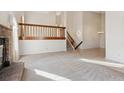 Open living and dining area with hardwood floors and loft at 19366 E Greenwood Pl, Aurora, CO 80013