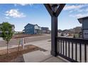 Scenic street view from the front porch showcases the neighborhood and surrounding homes at 8581 Eckley St, Littleton, CO 80125