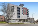 Daytime view of the modern condo building featuring multiple private balconies at 2374 S University Blvd # 402, Denver, CO 80210