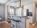 Bright kitchen with stainless steel appliances and granite countertops, plus seating at 20 S Harrison St, Denver, CO 80209