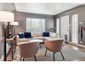 Cozy living room featuring hardwood floors, a large window and comfortable seating at 20 S Harrison St, Denver, CO 80209