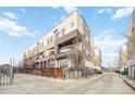 Street view of modern townhomes showcasing architectural design and community setting at 2622 W 24Th Ave # 4, Denver, CO 80211