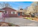 Beautiful brick home featuring a neatly kept front yard at 5285 E Iliff Ave, Denver, CO 80222