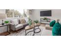 Inviting living room with comfortable seating, contemporary furnishings, and a cozy atmosphere at 9120 Judson St, Westminster, CO 80031