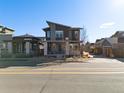 Charming home exterior view showing the architectural style and neighborhood setting at 10610 E 26Th Ave, Aurora, CO 80010