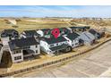 Aerial view of the modern homes in this suburban community with spacious backyards at 3378 Backdrop Ct, Castle Rock, CO 80108