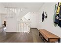 Welcoming entryway featuring stairs, a bench, and coat hooks for added convenience at 1370 S Idalia St # A, Aurora, CO 80017