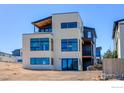Striking modern home boasts a clean design with large windows at 2305 Glacier Ct, Lafayette, CO 80026