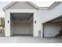 Spacious two-car garage showcasing ample room and natural light, perfect for storage and projects at 1361 Art Dr, Berthoud, CO 80513