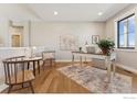 Bright and airy home office with a stylish desk, comfortable seating, and ample natural light at 1361 Art Dr, Berthoud, CO 80513