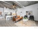Open concept kitchen with island and stainless steel appliances at 3401 Arapahoe Ave # 218, Boulder, CO 80303