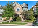 Charming two-story home featuring a stone facade, well-maintained landscaping, and a welcoming front porch at 3766 Ridgeway St, Boulder, CO 80301