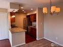 Modern kitchen with granite countertops and stainless steel appliances at 4658 White Rock Cir # 5, Boulder, CO 80301