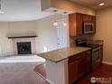 Open kitchen with granite countertops and stainless steel appliances at 4658 White Rock Cir # 5, Boulder, CO 80301