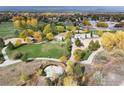 Aerial view of a park with playground and sports fields at 1463 Moonlight Dr, Longmont, CO 80504