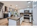 Modern kitchen with stainless steel appliances and granite countertops at 5920 Gunbarrel Ave # C, Boulder, CO 80301