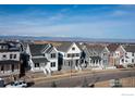 Street view of homes with mountain views at 154 Westerly Blvd, Erie, CO 80516