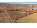 An aerial image that showcases property lines and barns set against the expansive countryside at 10635 County Road 24, Fort Lupton, CO 80621