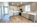 Modern kitchen featuring stainless steel appliances and durable countertops at 2277 Serenidad St, Brighton, CO 80601