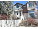 Townhome exterior with steps and landscaping at 4110 Riley Dr, Longmont, CO 80503