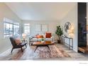 Bright living room with modern sofa and stylish decor at 1127 Red Oak Dr, Longmont, CO 80504