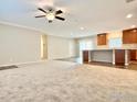 Open living space with kitchen and island at 17913 County Road 38, Platteville, CO 80651