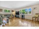Spacious living area with hardwood floors and ample natural light at 1950 Glenwood Dr, Boulder, CO 80304