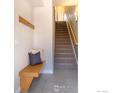Entryway with staircase and built-in bench at 2164 E Hecla Dr # B, Louisville, CO 80027