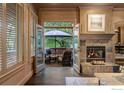 View from the living room to a cozy patio with outdoor seating at 820 6Th St, Boulder, CO 80302