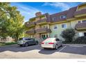 Exterior view of the building with parking in front at 3150 Iris Ave # 303, Boulder, CO 80301