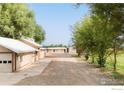 Farm outbuildings, including barns and garages at 6789 Niwot Rd, Longmont, CO 80503