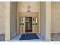 Building entrance with a well-maintained exterior at 7645 E Quincy Ave # 306, Denver, CO 80237