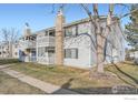 Side view of a condo building showcasing its design at 14454 E Colorado Dr # 203, Aurora, CO 80012