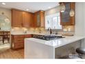 Modern kitchen with white countertops, stainless steel appliances, and ample cabinet space at 1620 Oak Ave, Boulder, CO 80304