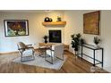 Stylish living area featuring modern decor, a sleek fireplace, and contemporary furnishings at 1620 Oak Ave, Boulder, CO 80304