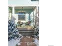 Cozy front porch with wicker chairs, perfect for relaxing at 833 Spruce St, Boulder, CO 80302