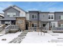 Modern townhome with gray and white exterior at 1524 Sun Way, Lafayette, CO 80026