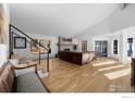 Bright living room featuring hardwood floors and a leather sectional sofa at 37 Wagner Cir, Boulder, CO 80304