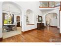 Spacious living room with hardwood floors and high ceilings at 2121 Jade Way, Longmont, CO 80504
