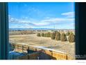 Scenic backyard view with mountain views at 10517 Taylor Ave, Firestone, CO 80504