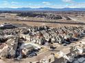 Aerial view of a townhome community with a pool at 12988 Grant W Cir # A, Thornton, CO 80241